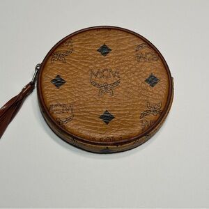 MCM Visetos 4" round coin purse, cognac leather, tassel